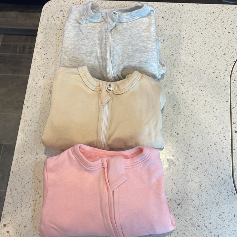 3 long sleeve onesies/with mitten sleeves- like new, hardly worn. Freshly washed